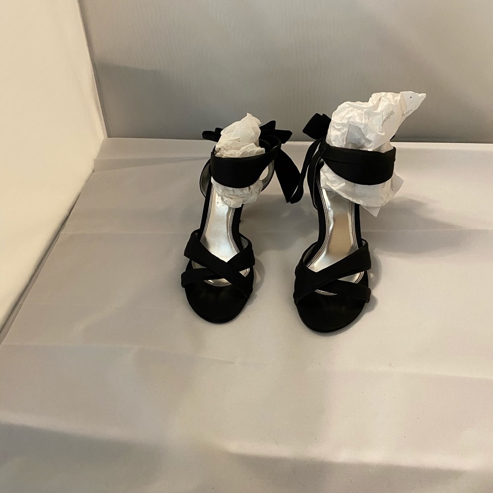 Gorgeous black stilettos with silver heels